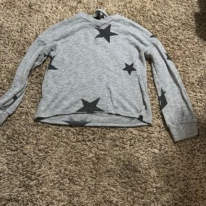 Grey sweater with black stars. Light weight.